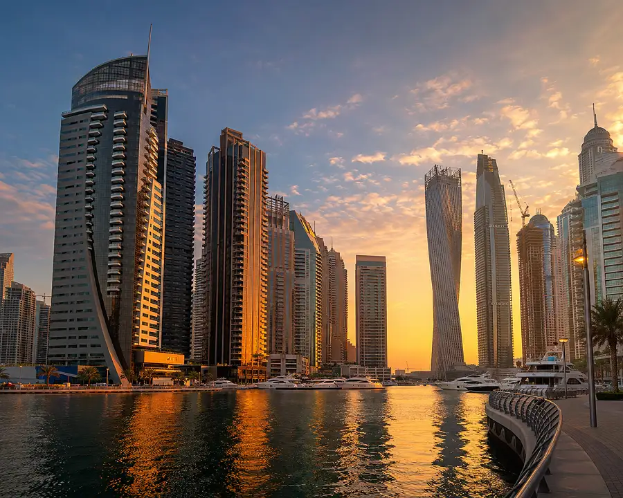 Dubai Marina waterfront towers and promenade at sunset